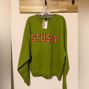 Stussy Olive Green Crewneck Sweatshirt with Orange Lettering